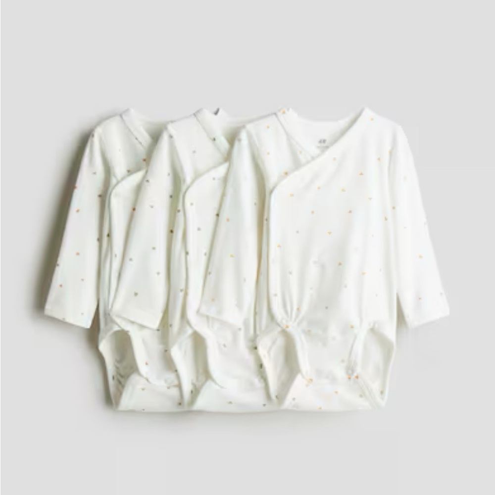 White Baby Bodysuits with heart Pattern